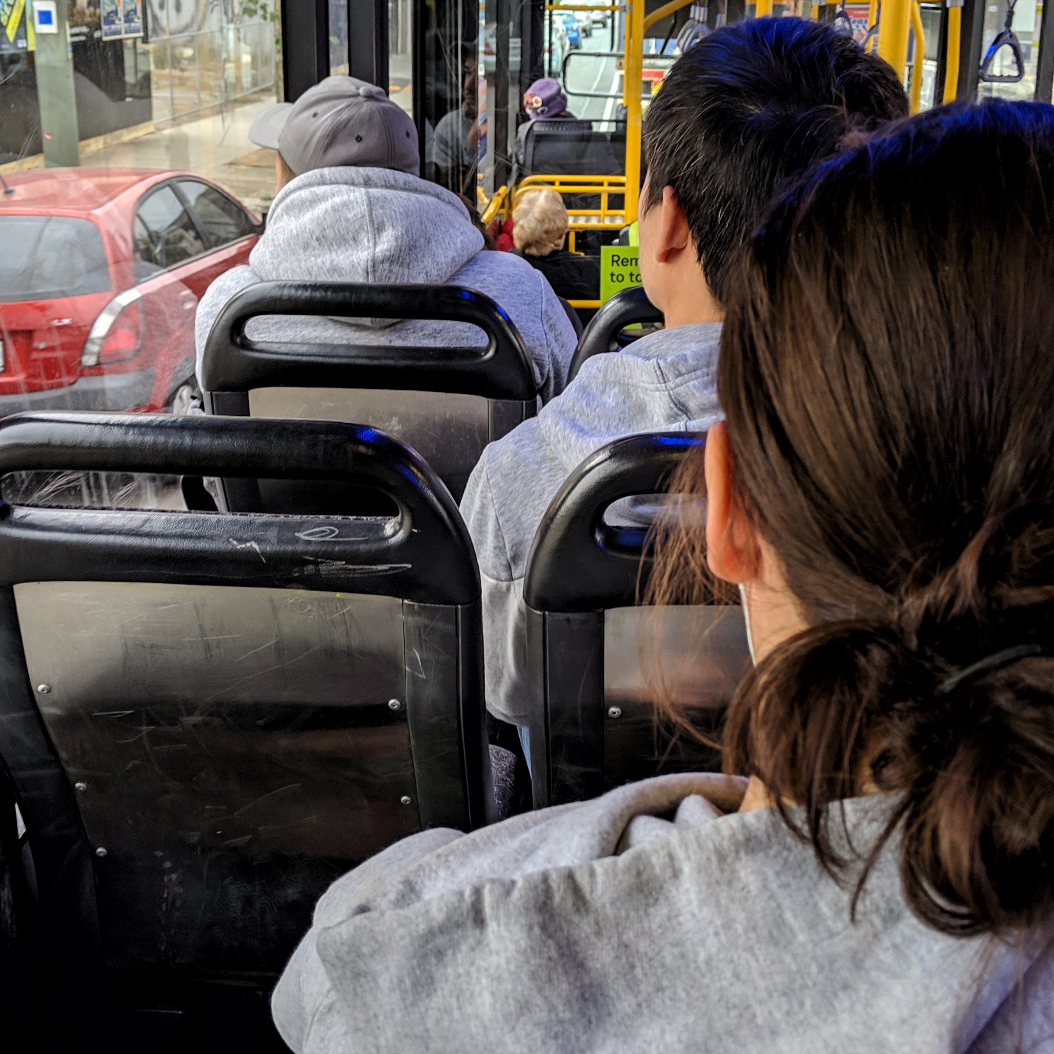 Three of my fellow morning commuters - sitting in almost a line ahead of me on the bus - are wearing light grey hoodies today!
