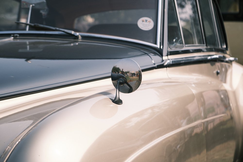 Reflections on the back of a Rolls Royce at Antique Car Show Karachi 2024