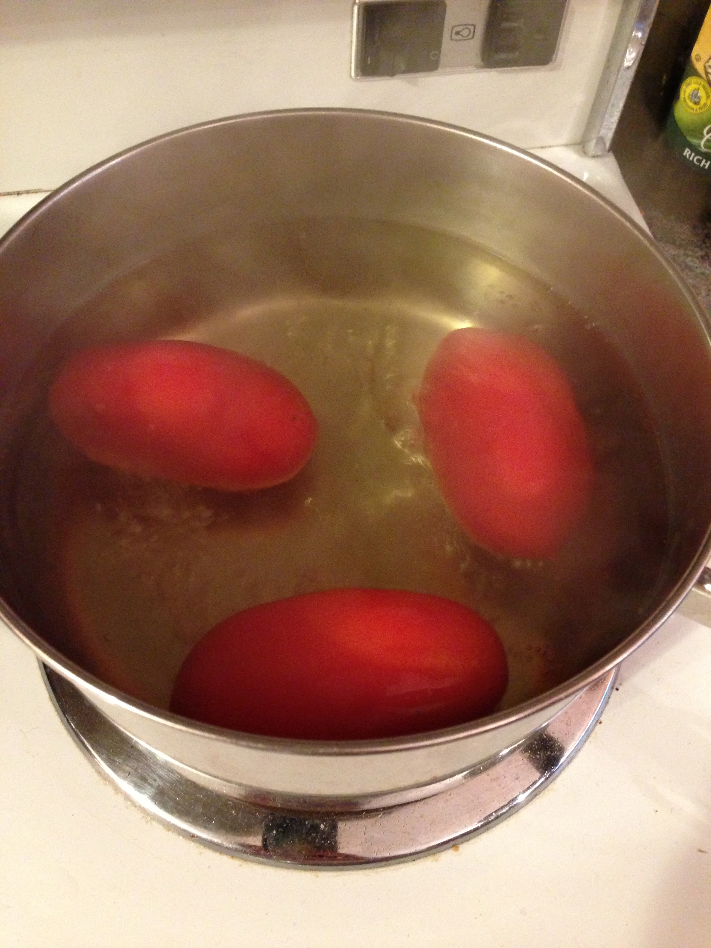 Blanching the tomatoes