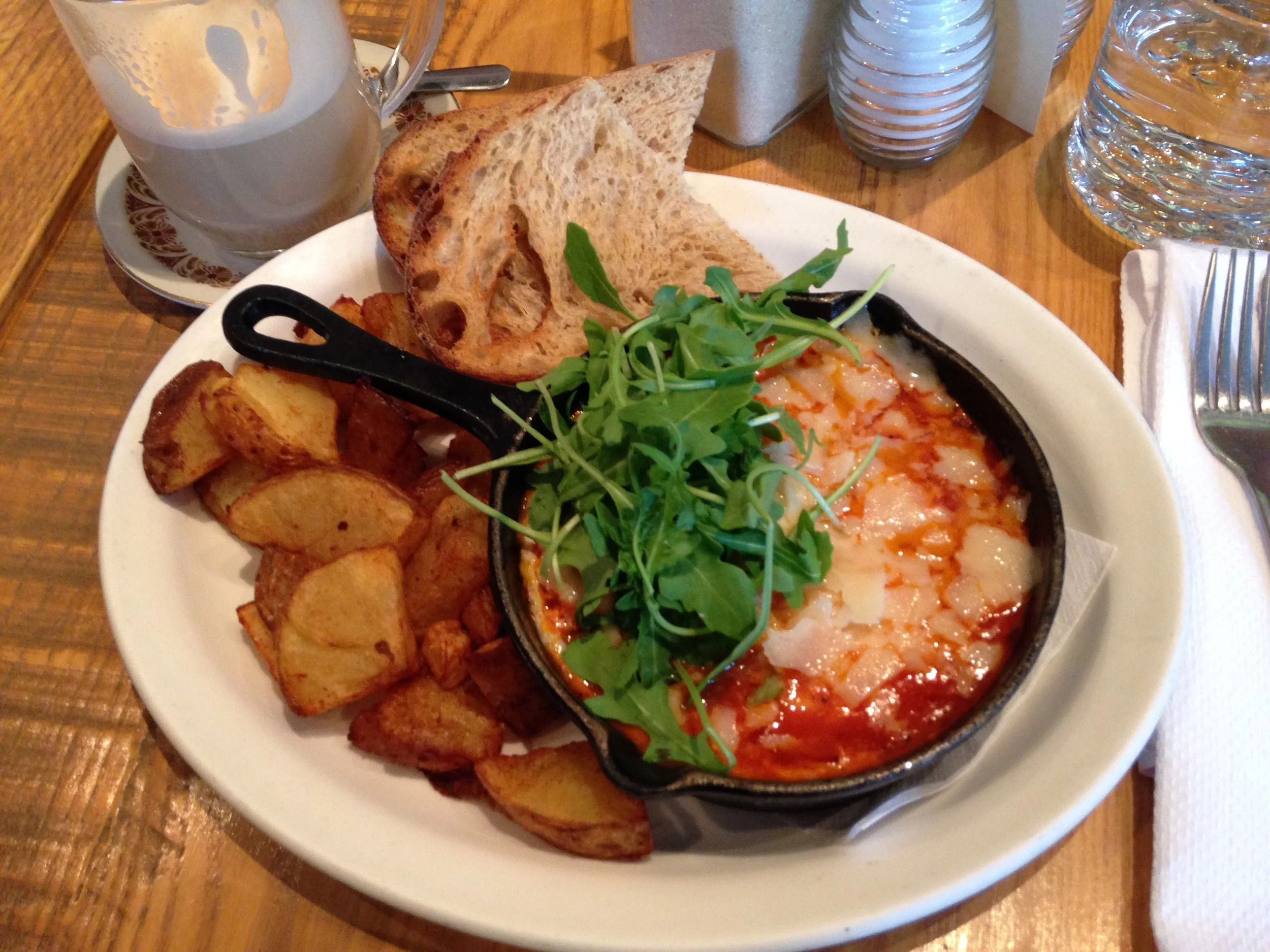 Eggs poached in a spicy tomato sauce. So Good.