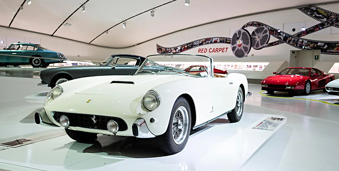 Casa Enzo Ferrari The new Ferrari museum with futuristic design in Modena is also a must for fine sports car lovers. From the F40 and 308 GTS to the Testarossa, this popular automotive museum features a full fleet of Ferrari and other sports vehicles. There are so many cool exhibitions available, along with virtual tours for those that cannot visit the museum in person. One of the best features at the museum is the virtual races – where guests can race against other tourists in their favorite simulated Ferrari cars! http://museomodena.ferrari.com/ Ferrari Museum