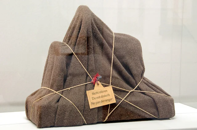 The Enigma of Isidore Ducasse by Man Ray, 1920