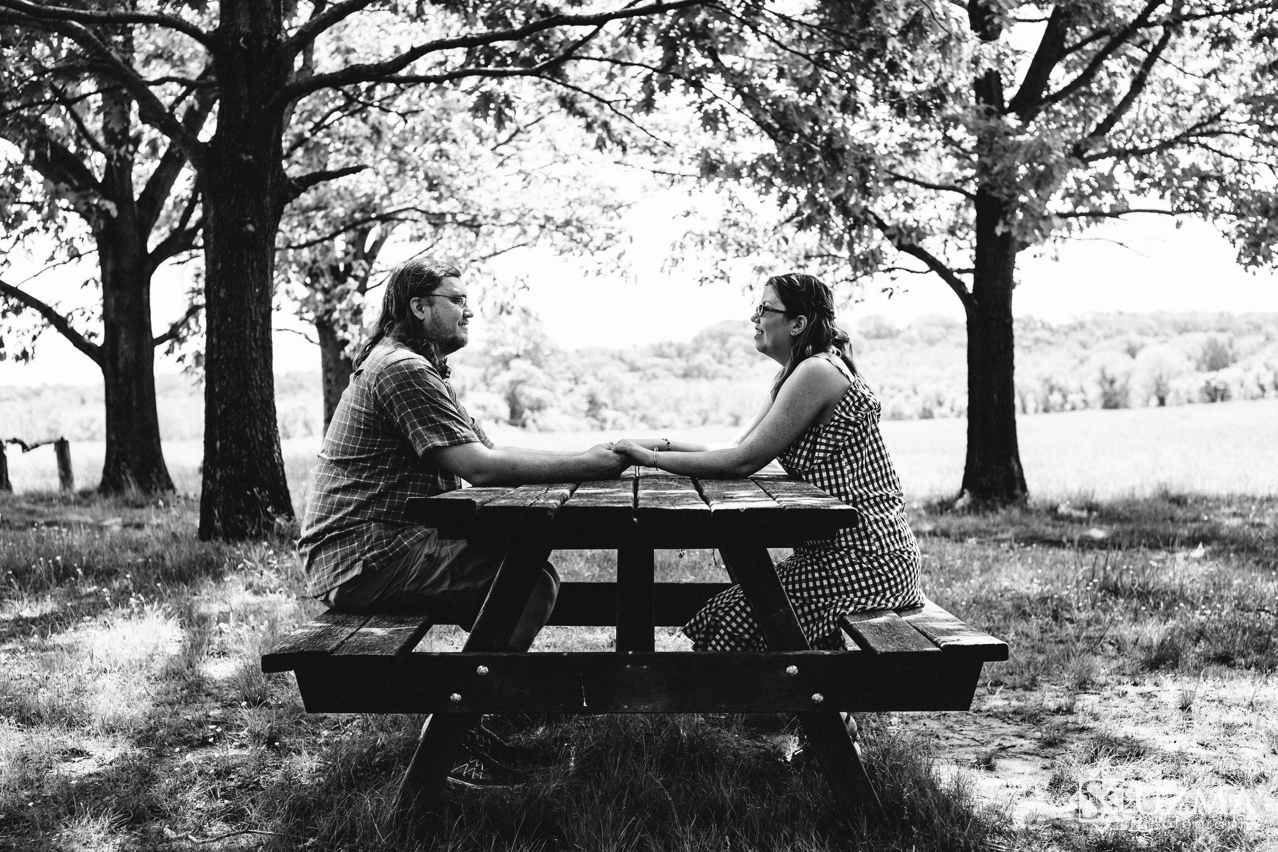 Liz and Andrew on a park bench