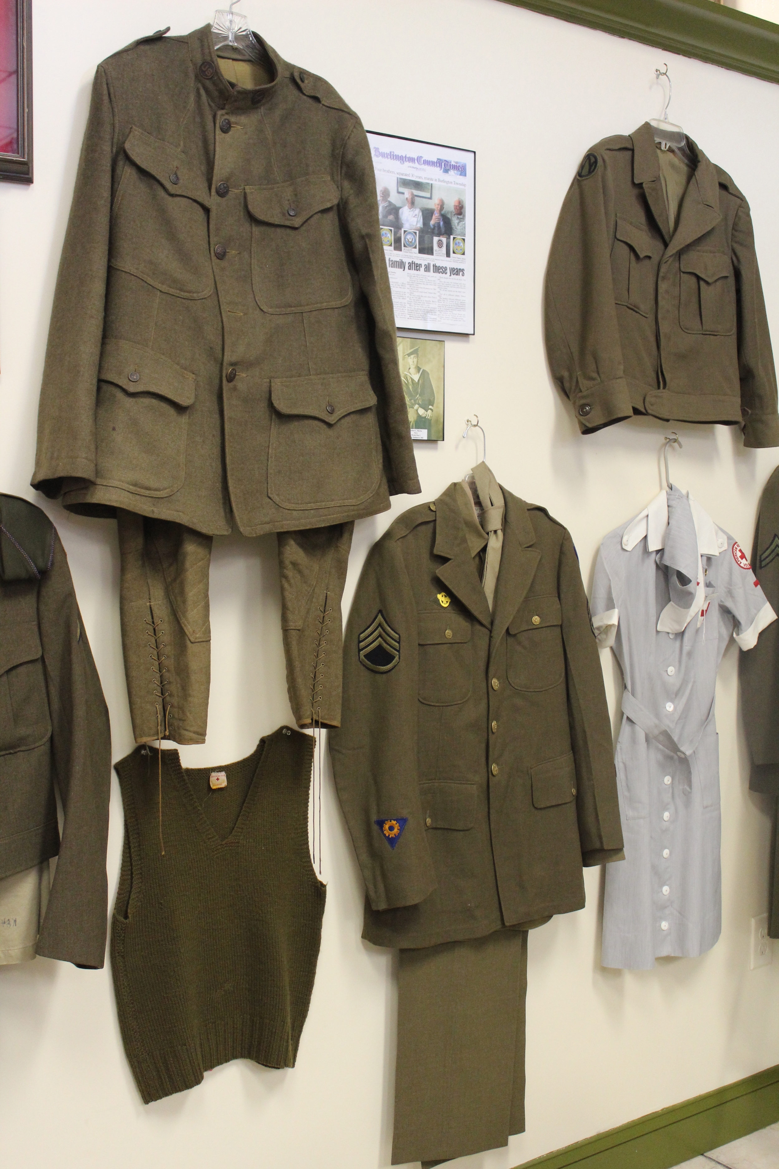 Some of the uniforms on display at the Veterans Cafe & Grille. The one on the upper left dates back to World War I.
