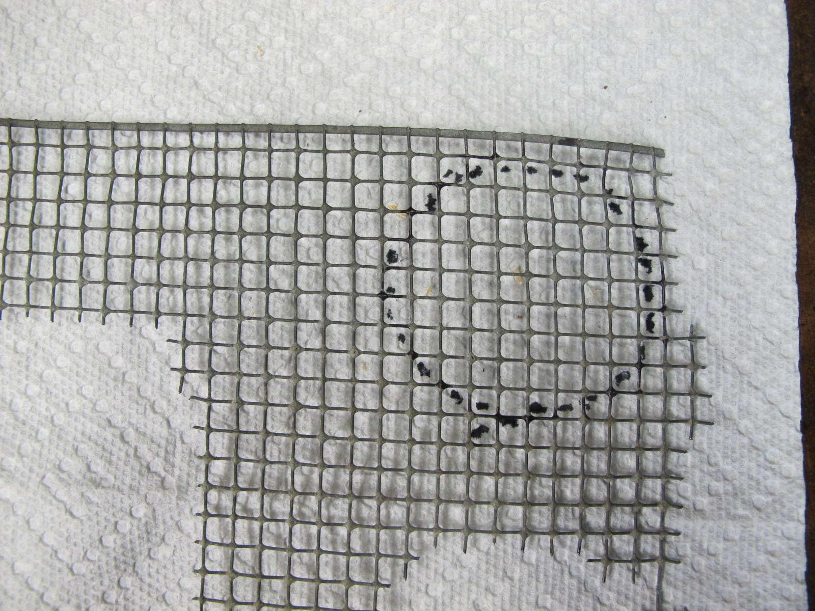  Cut out patter on wire mesh. 