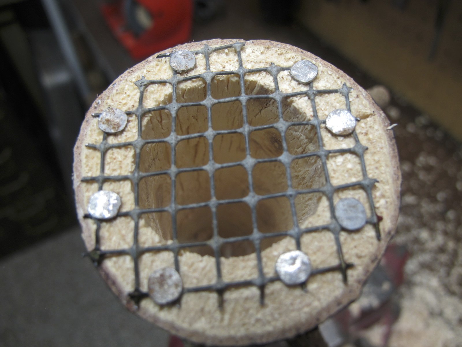  Attach wire mesh bottom using small broad headed nails or tacts to secure into place. 