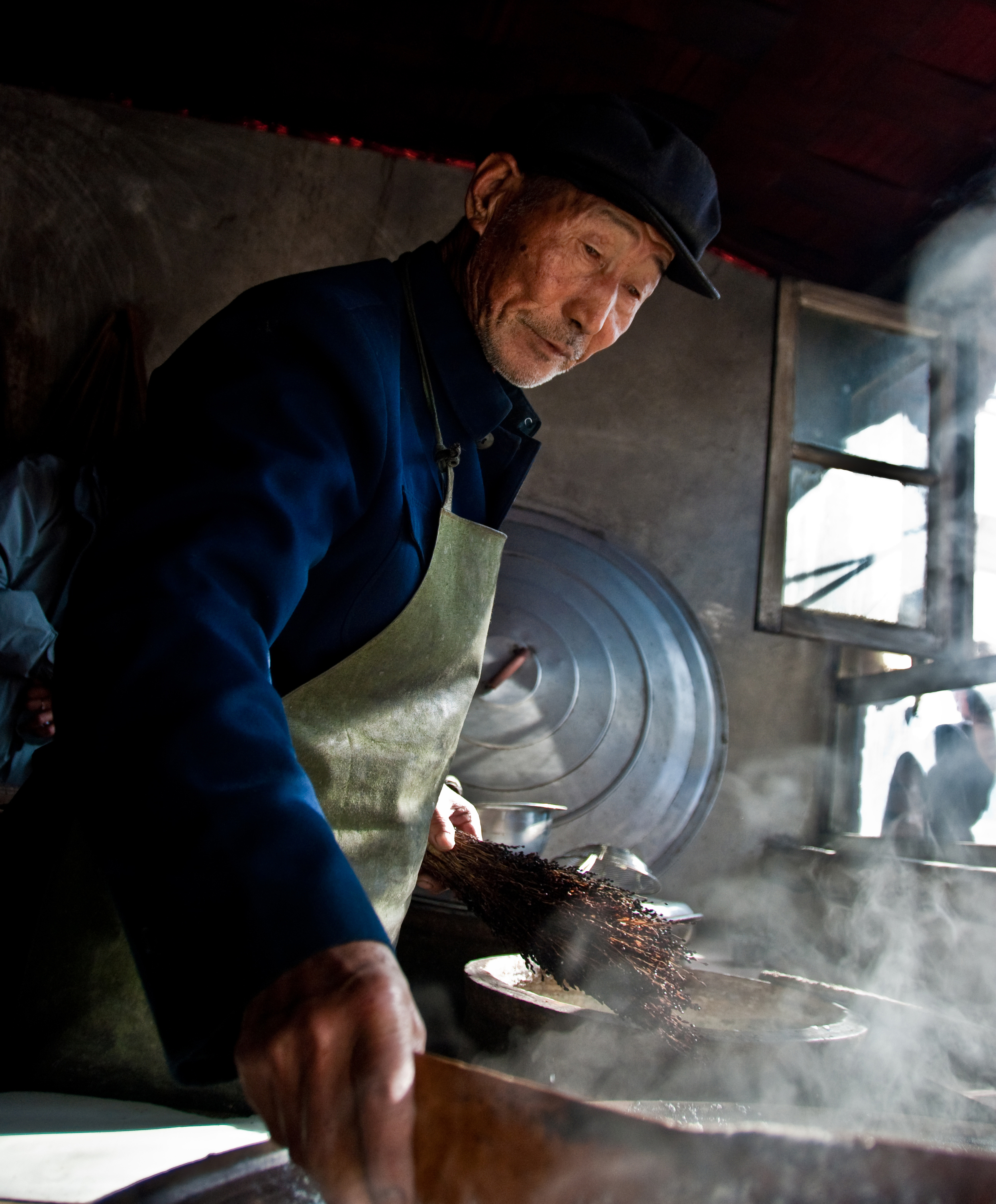  BEIJING, CHINA – A tofu maker in the rural outskirts of Beijing readies a batch of tofu in March 2009. 