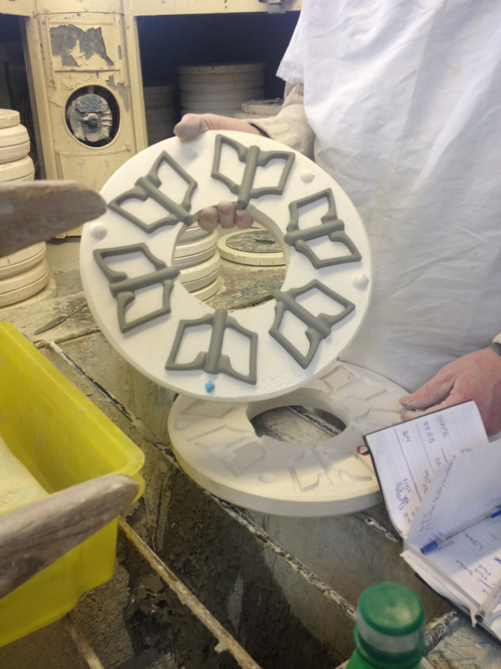 handles are cast in pairs and then separated for sticking onto cups.