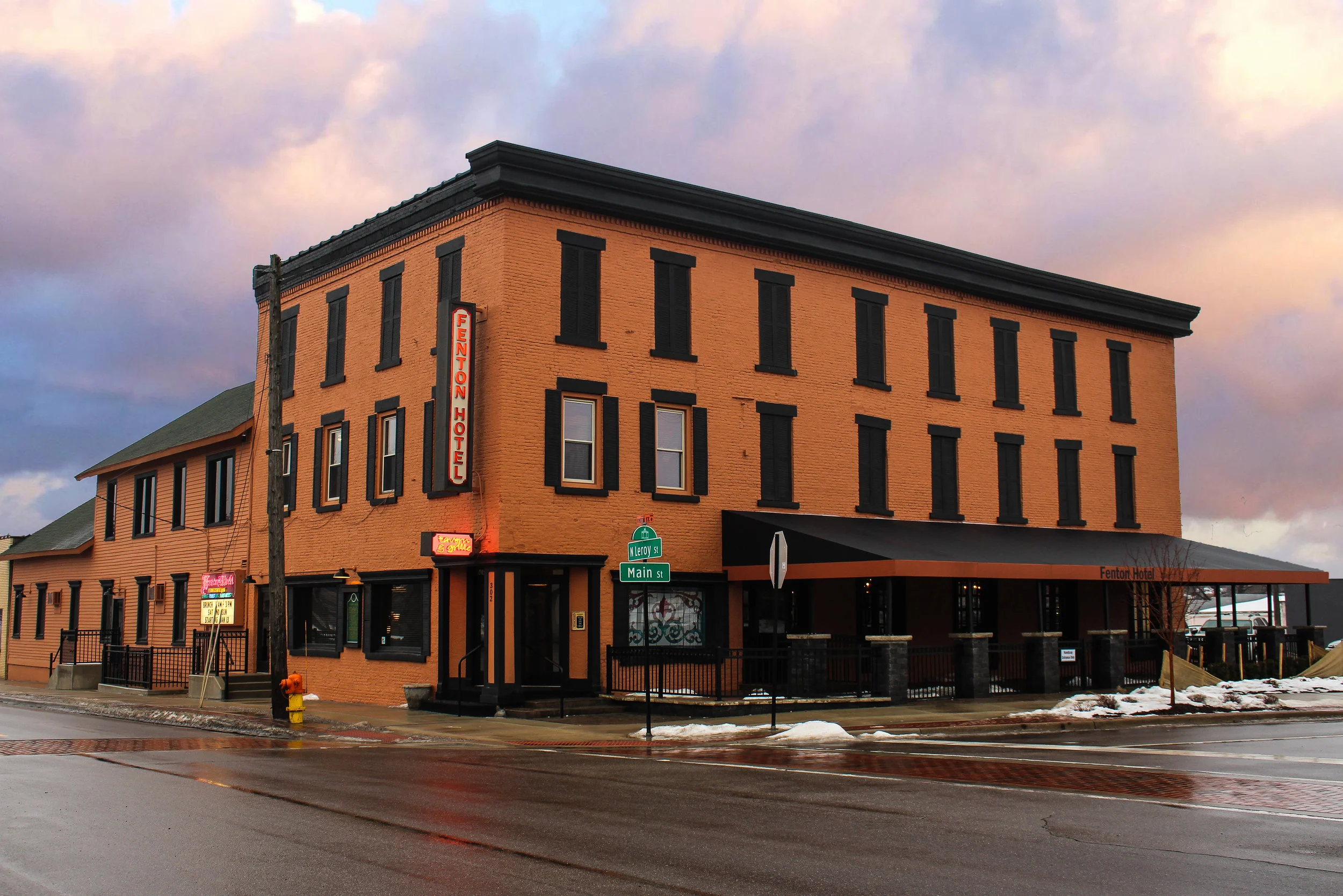 Historic orange-brick Fenton Hotel Tavern & Grille in Fenton, Michigan
