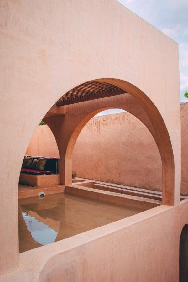 Casa_Liquen_oudoor_patio_furniture_pink_arches_Swimming_pool_Forrest_Glover_Design_Punta_Mita_Interior_design_trends_2024_Mexico.jpeg