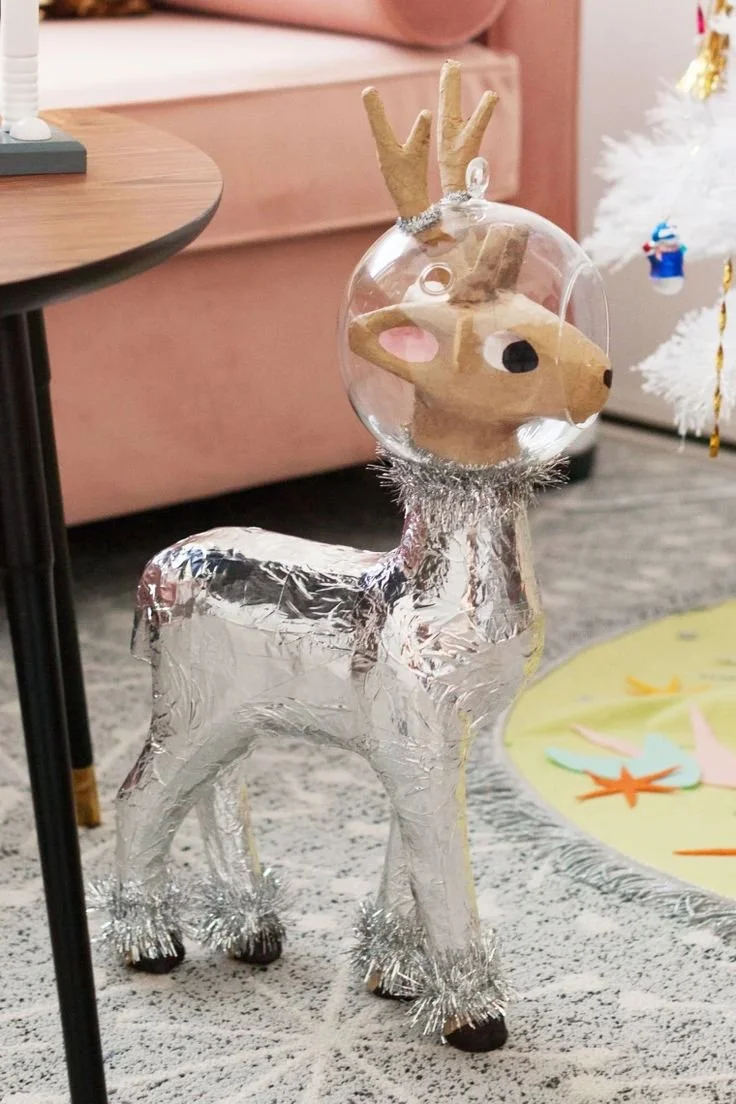 Forrest_Glover_Design_Holiday_Trends_2023_Home_Decor_Interior_Design_Disco_Ball_Christmas_modern-unique-Christmas-tree_DIY Retro Inspired Christmas Space Age Reindeer.jpeg