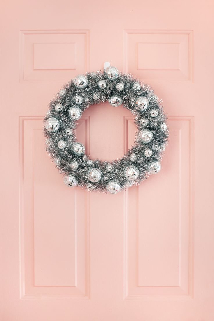 Forrest_Glover_Design_Holiday_Trends_2023_Home_Decor_Interior_Design_Disco_Ball_Christmas_modern-unique-Christmas-tree_disco-wreath-front-door.jpeg