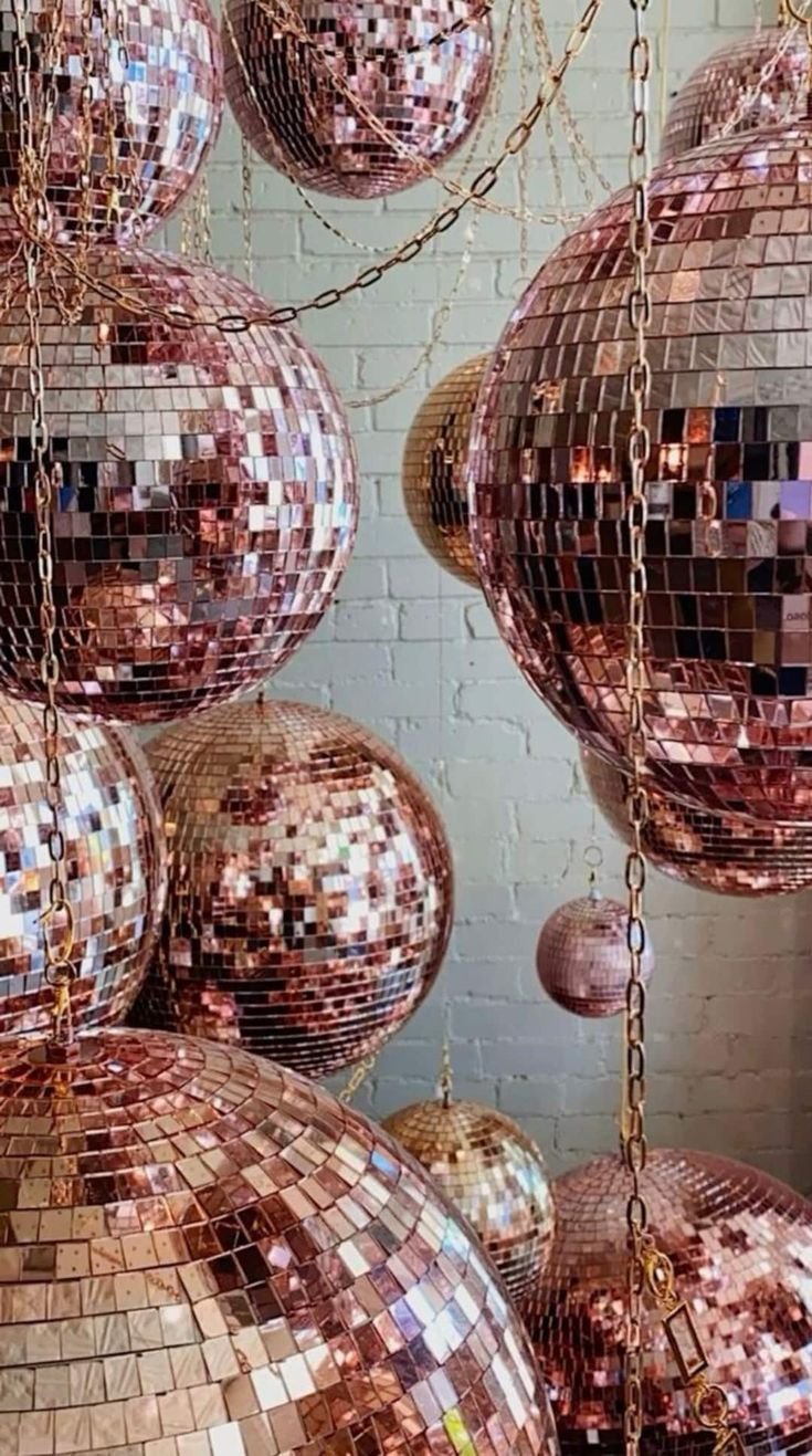 Forrest_Glover_Design_Holiday_Trends_2023_Home_Decor_Interior_Design_Disco_Ball_Christmas_modern-unique-Christmas-tree_Rose Gold Pink Disco Ball Decor .jpeg