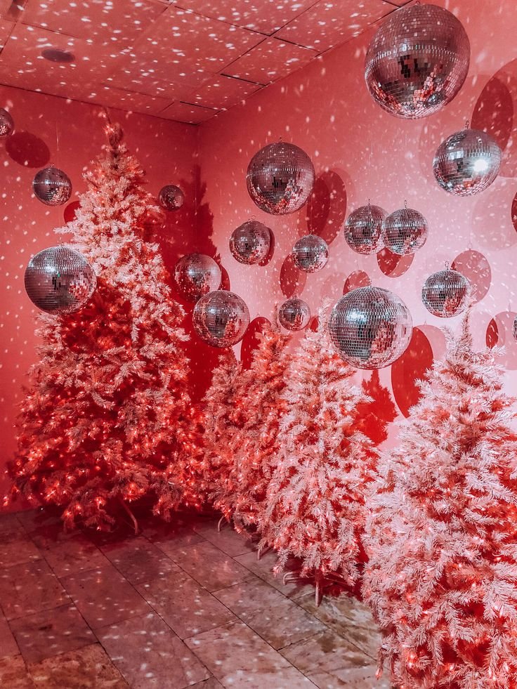 Forrest_Glover_Design_Holiday_Trends_2023_Home_Decor_Interior_Design_Disco_Ball_Christmas_modern-unique-Christmas-tree_Pink Christmas Decor with Disco Balls.jpeg