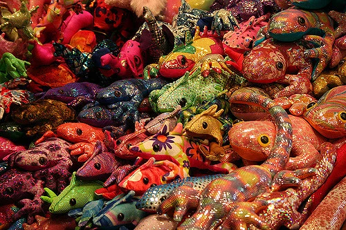 Visit Mao Thao's Cloth & Fiber art booth that includes a whole wall of sand-filled, hand-made animals