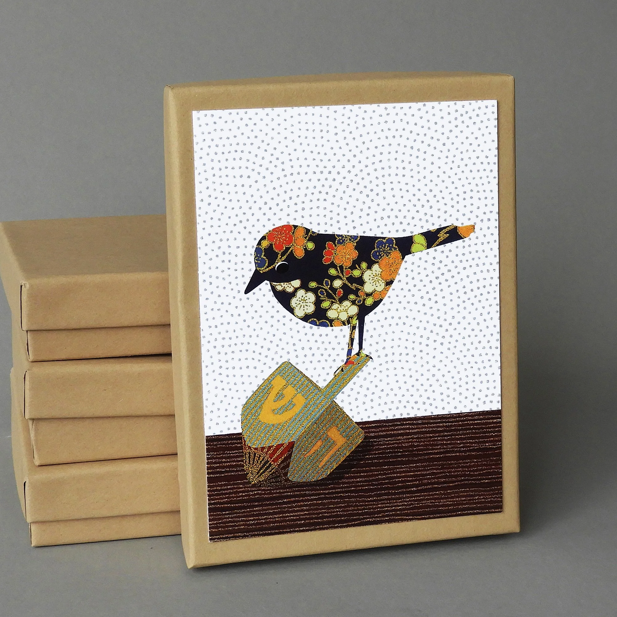 bird with dreidel box.JPG