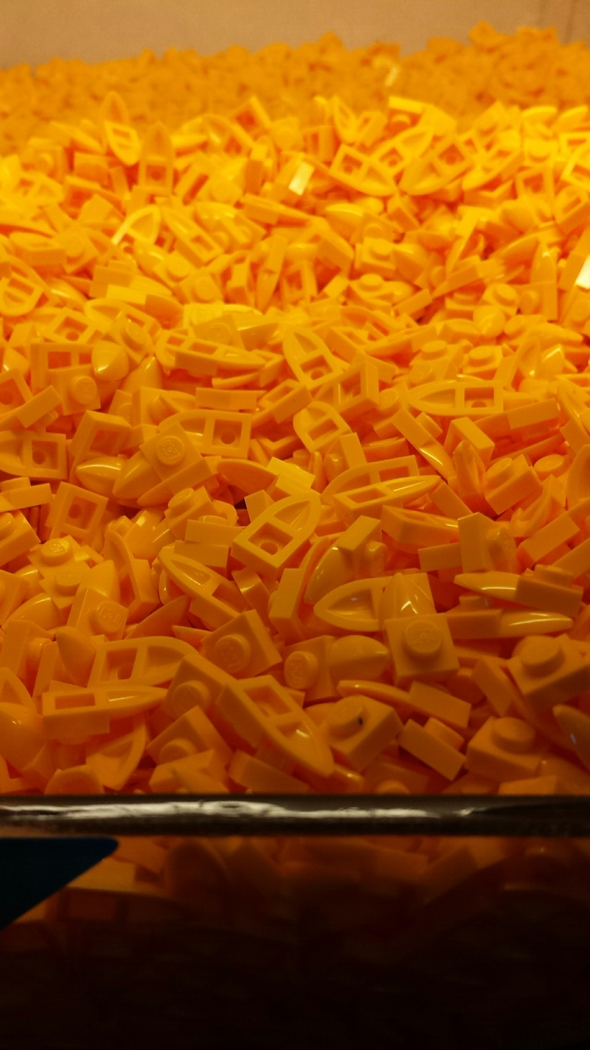 1x2 modified plates in light orange -- let's just call them duck's beaks.