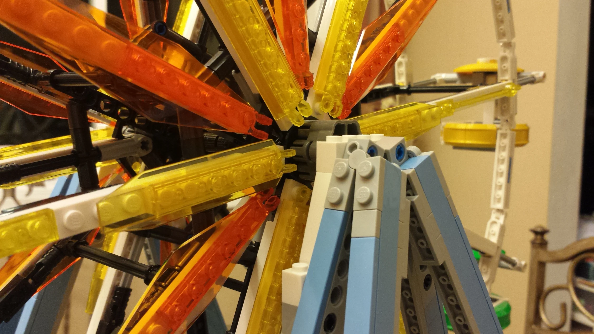 Trans-yellow and orange fins brighten up the wheel's spokes.