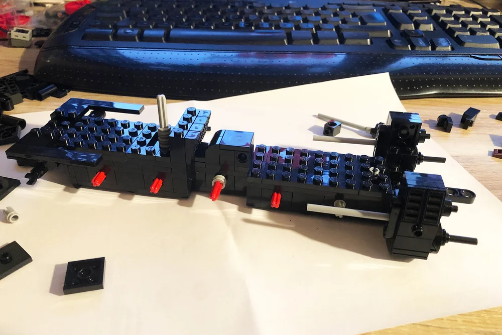  Cylinders and frame taking shape. Working at my desk as you can see. In the end powering went back to the fourth axle due to wiring issues. 