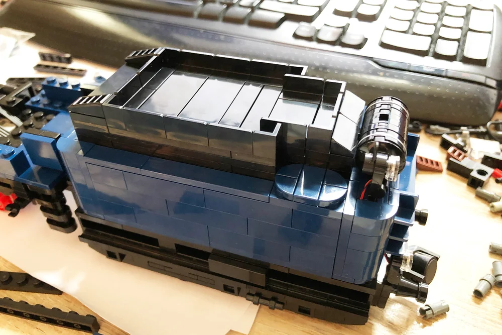  First draft of the tender still with stacked bricks as sides and a black top. 