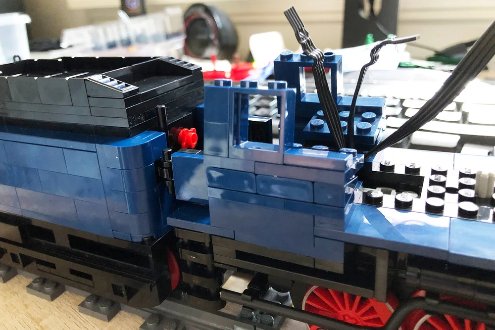  Wiring and the driver cab with inward slope taking shape. 