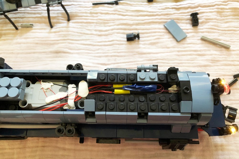  Final step in the assembly was to solder the wiring to the adapter cables. Big thanks to UrbanErwin for doing this. As you can see I use small pieces of adhesive pads to keep the wires in place. Nothing more frustrating than having the electrics rea