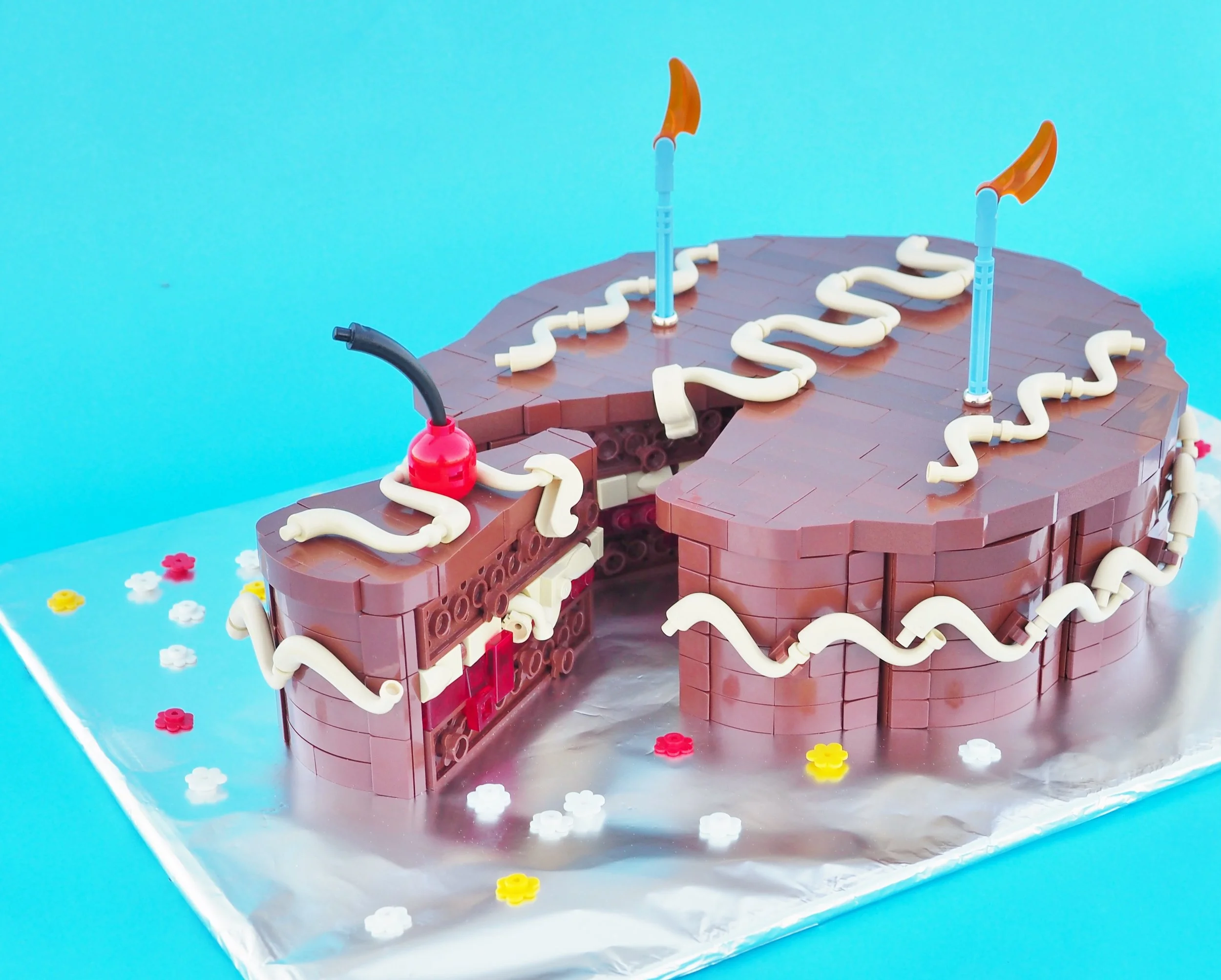  the cherry is meant to catch  your eye as a pop of red against all the blue and brown 