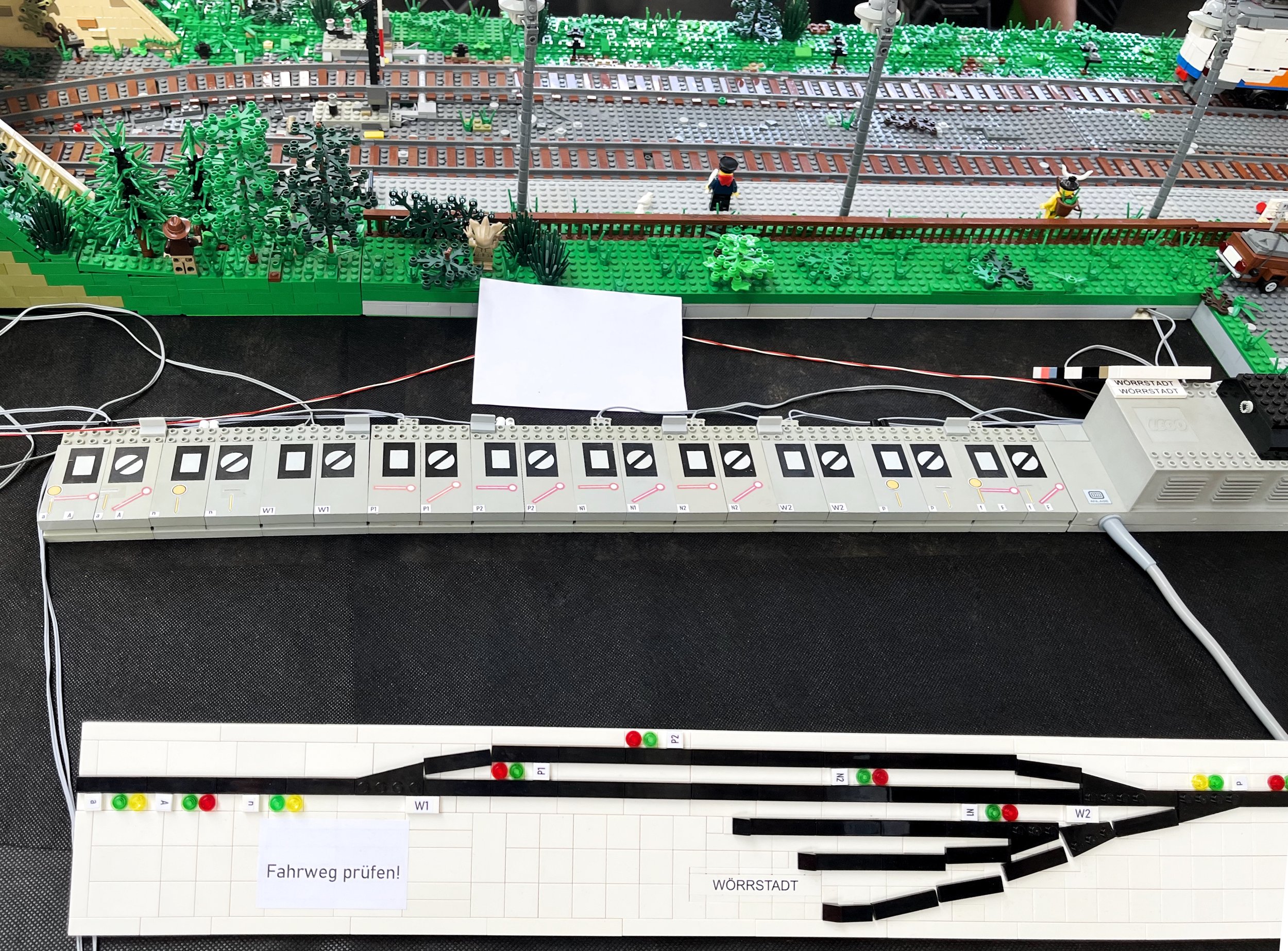 A clever way of "hacking" old LEGO 12V system components into a control panel.  (Part of Nick Kleinfelder's Wörrstadt layout)