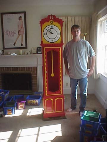 Eric standing with the clock
