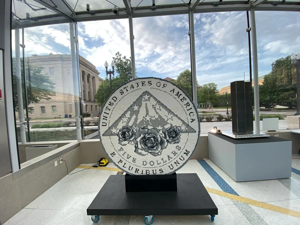  This commissioned coin built with LEGO bricks resides at the National Law Enforcement Memorial and Museum - Source: Mel Brown 