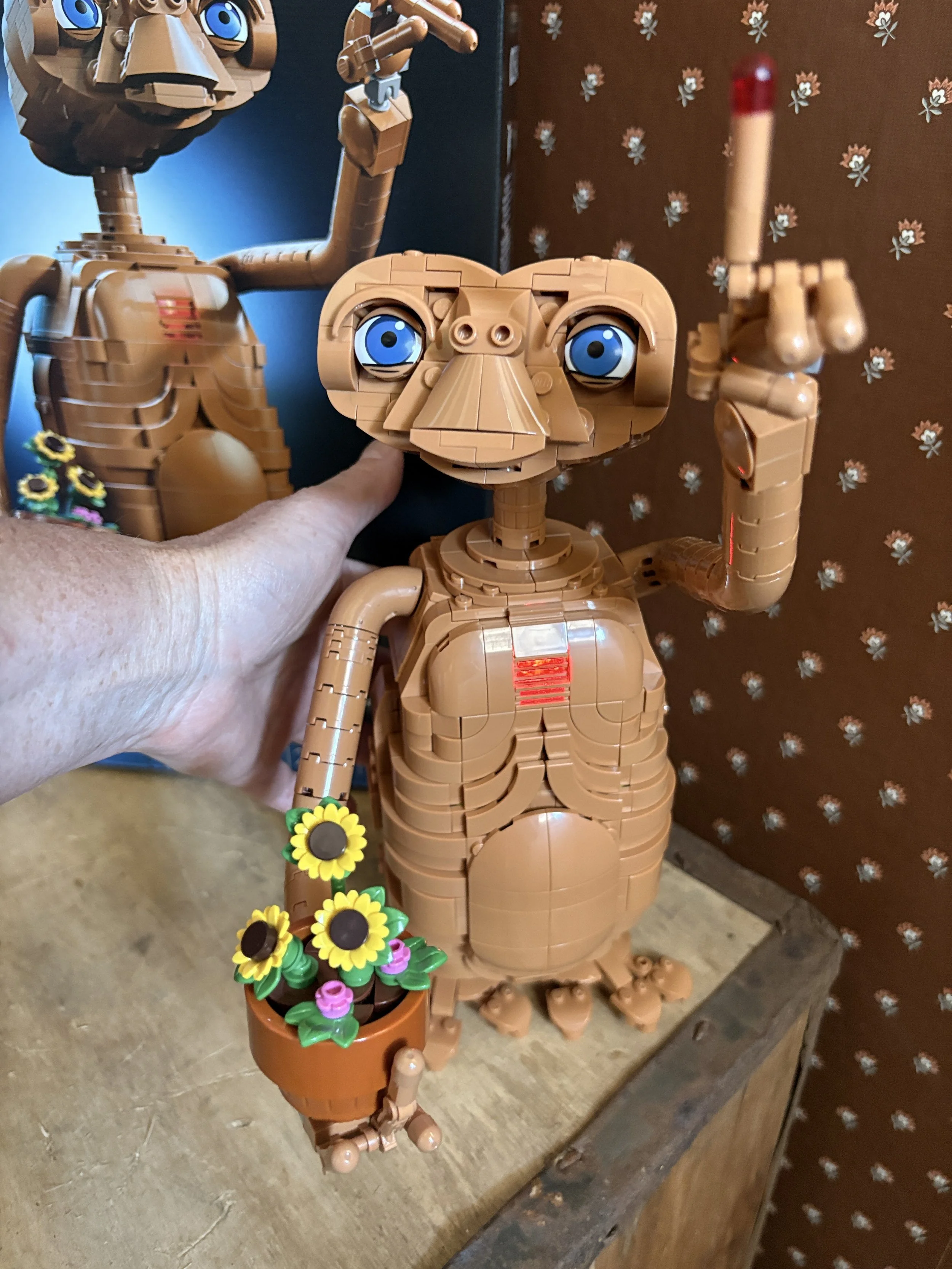 Push the lever on the back of E.T. and he lights up!