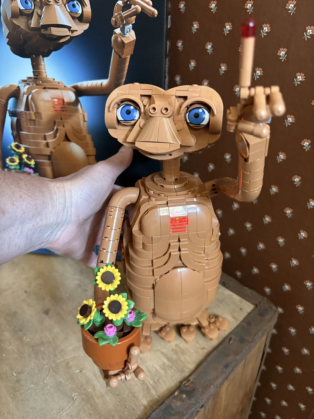 Push the lever on the back of E.T. and he lights up!