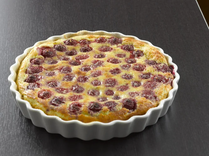 Raspberry Claufoutis : Almond and vanilla balance with the natural flavors and acidity of the baked raspberries.