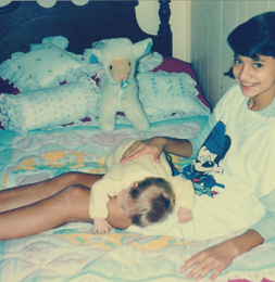 Burping my baby sister, Dimi