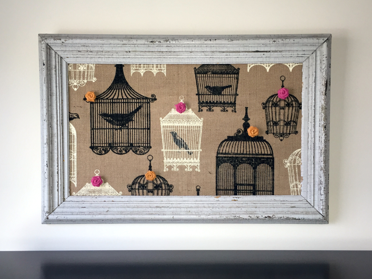 Framed Burlap hung on wall.