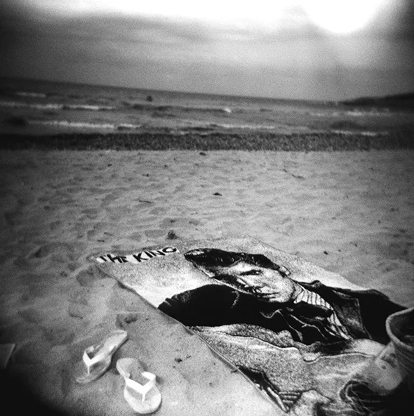 My first images are taken with a plastic camera, which allows overexposure effects and contrasts that resemble the Mediterranean light. I like the square format, less realistic, like the Rolleiflex, which I use later in Naples. The cellphone that I choose to use in Paris lacks quality, but allows me to get closer to my subject. I print these images on basic photo paper, a series that I recompose through the form of “wall-collages”.
