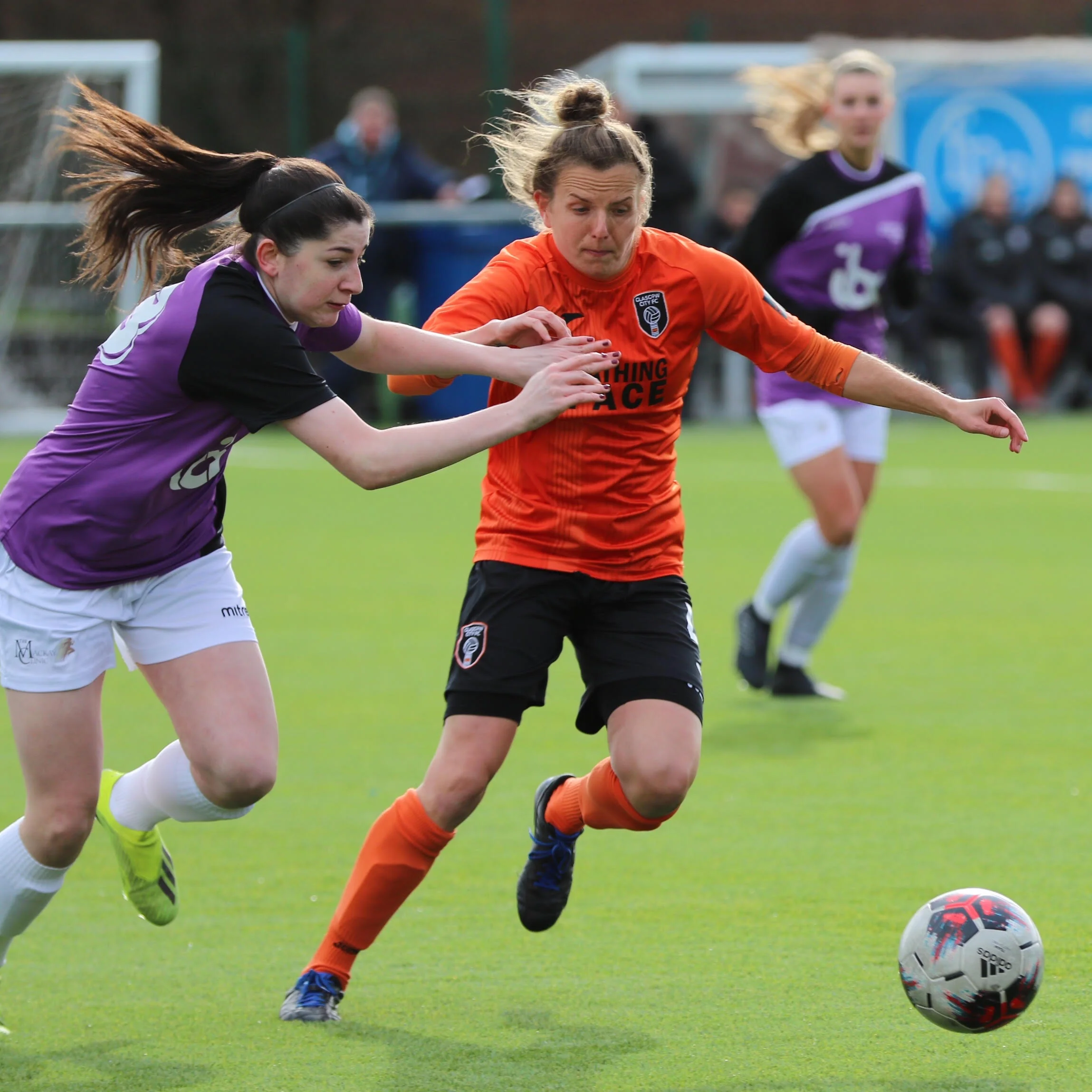 Kirsty Howat holds off the Stirling defence image by Tommy Hughes