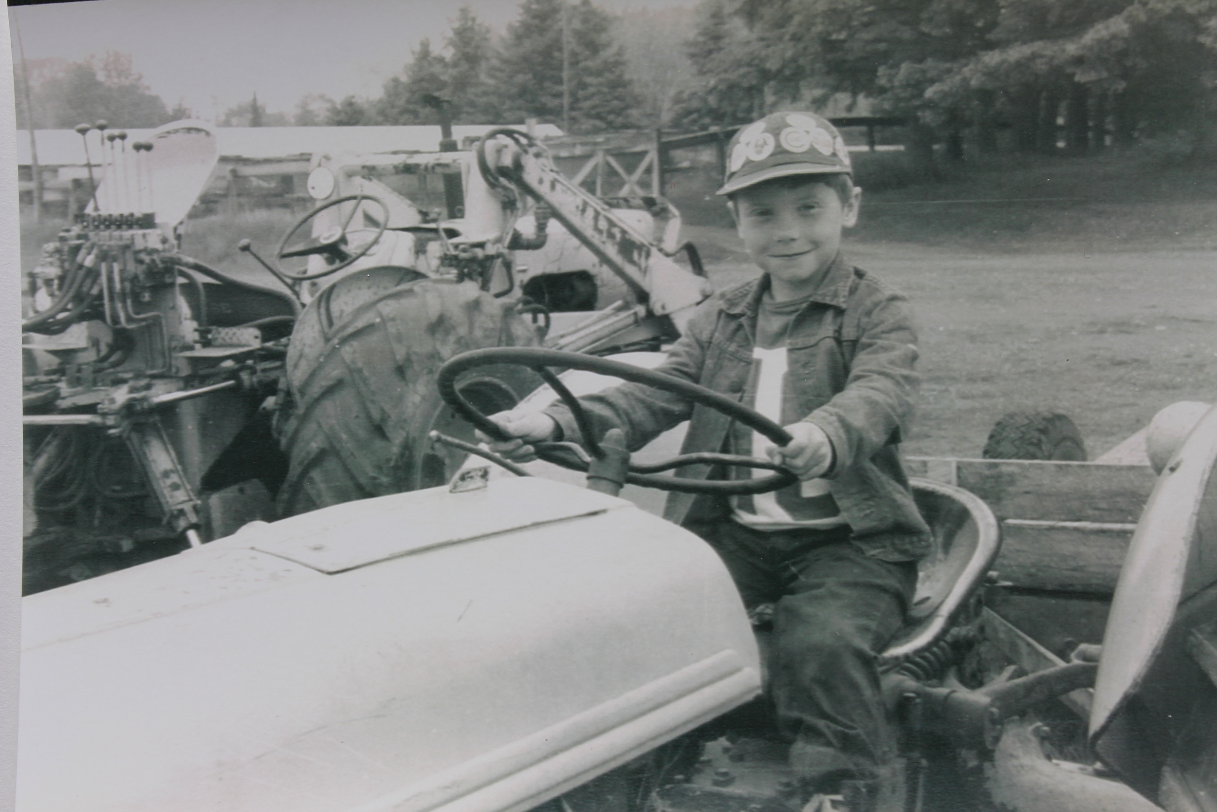  A tractor and me. Approximately 1976. Ogema, WI  ​ 
