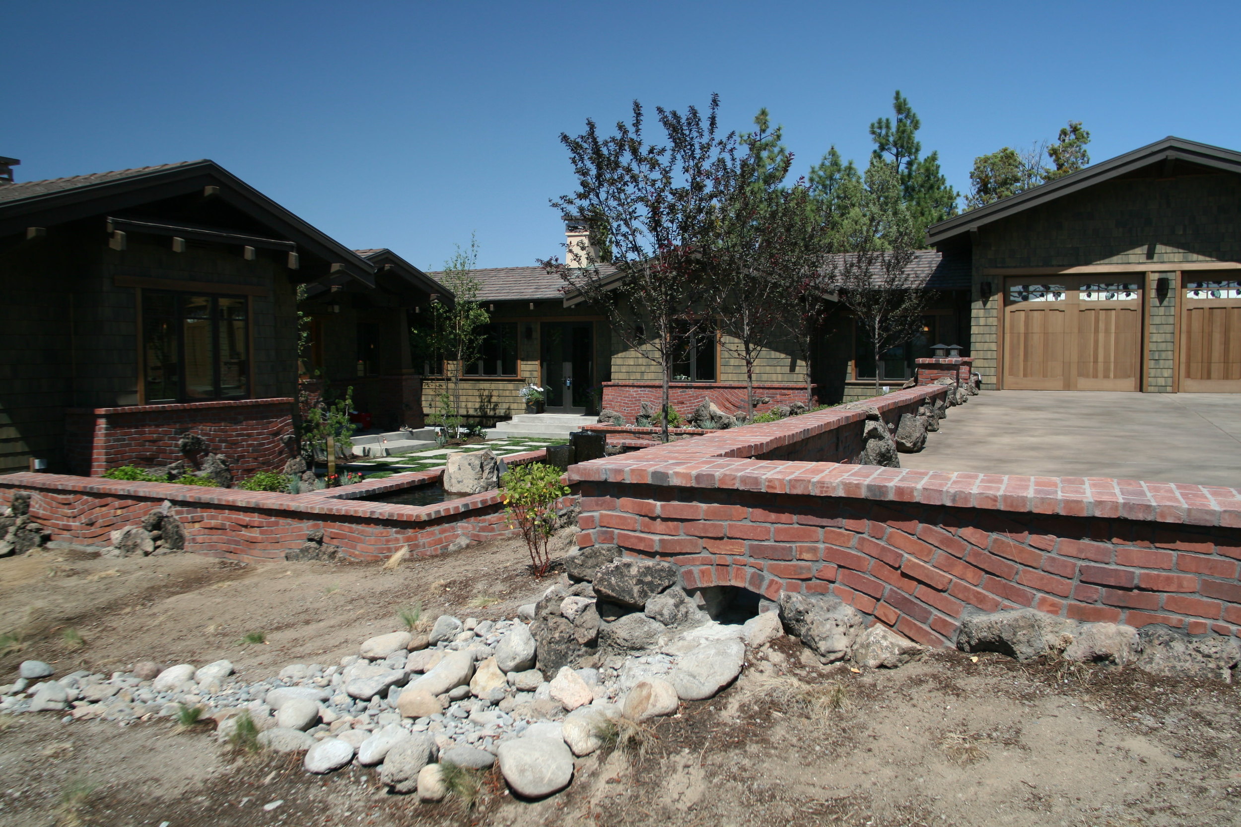 This home on Awbrey Butte is one of the few truly Craftsman-style homes in the area. It also shows the use of exposed brick.