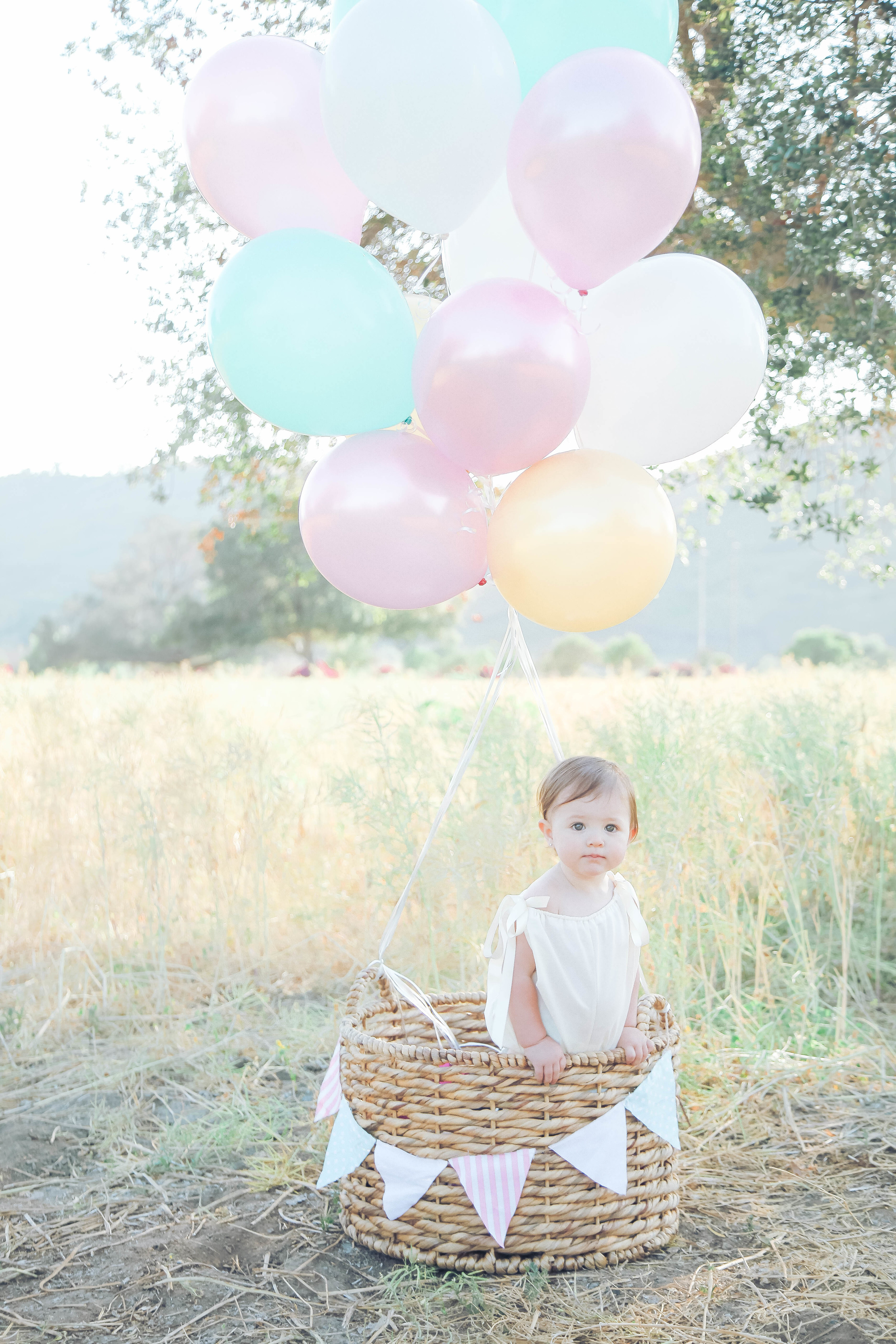 baby photoshoot with balloons
