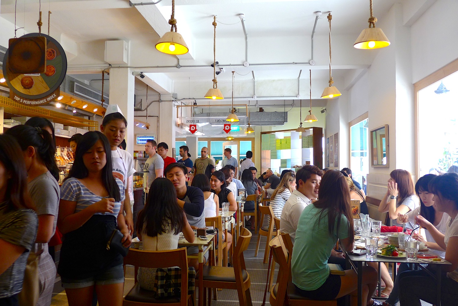 Fully packed and busy bakery during a Saturday morning.