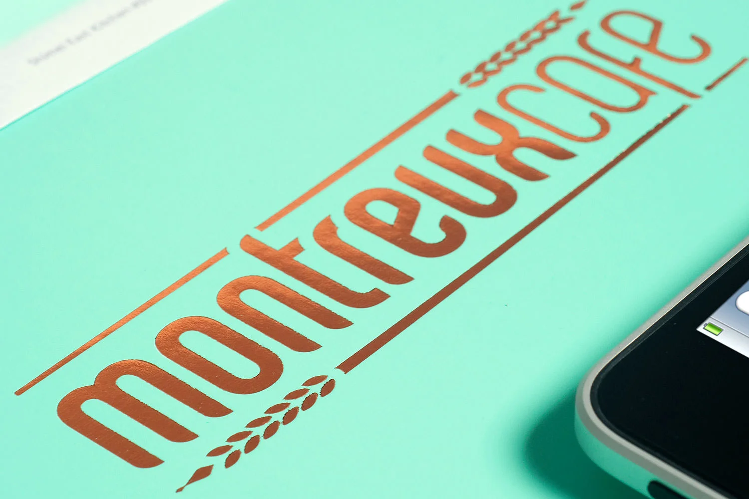 Montreux Café SG branding identity design - Foil-stamped logo on packaging.