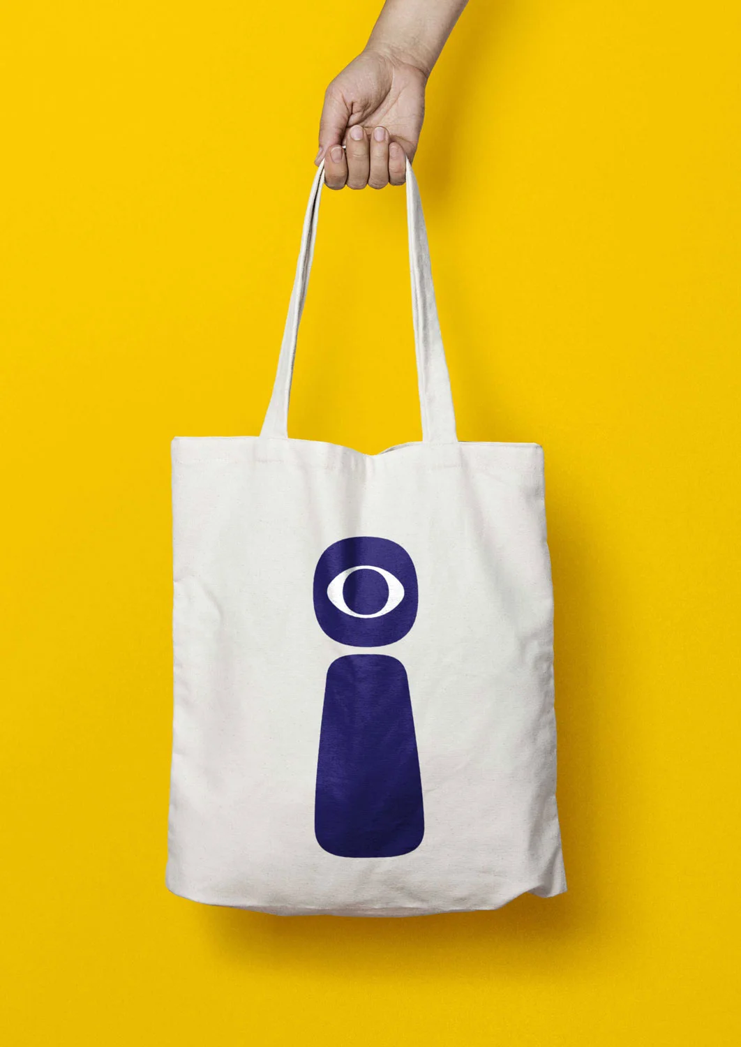 Identity design for EYEYAH! tote bag with secondary logo application.