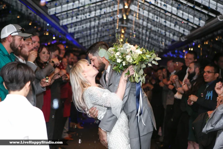 www.livehappystudio-orlando-science-center-wedding-photography-bridge-kiss-exit-41.jpg