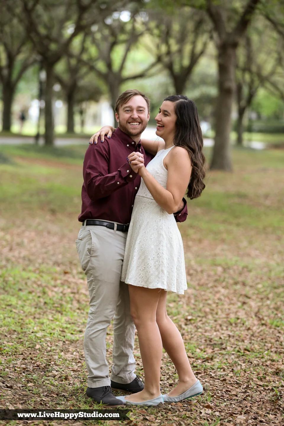 www.livehappystudio.com-cypress-grove-park-orlando-florida-engagement-photographer-candid-road-of-trees25.jpg