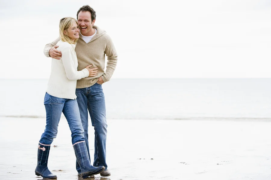 bigstock-Couples-Walking-On-Beach-Arm-I-4135186.jpg