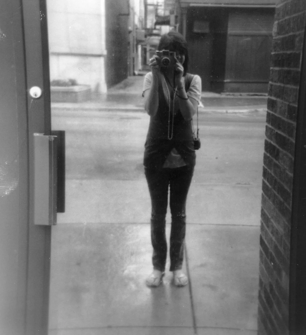 I can't resist a self-portrait in a shiny window.