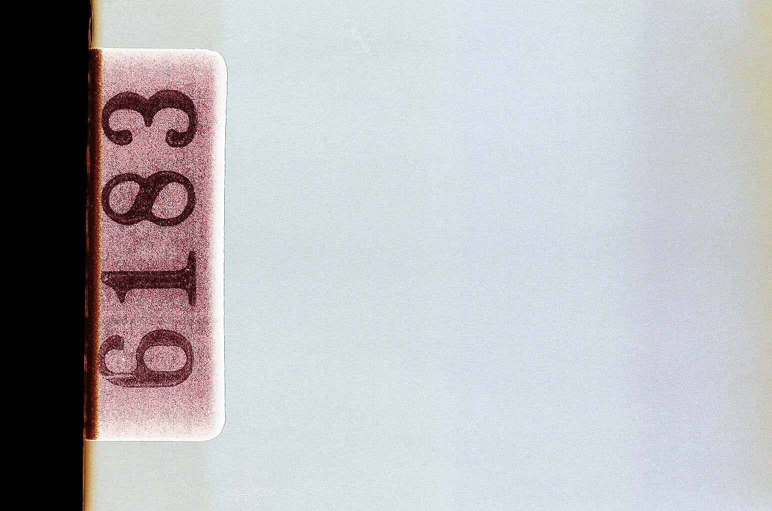 Occasionally when film is being processed, the ends get scanned, including stickers.