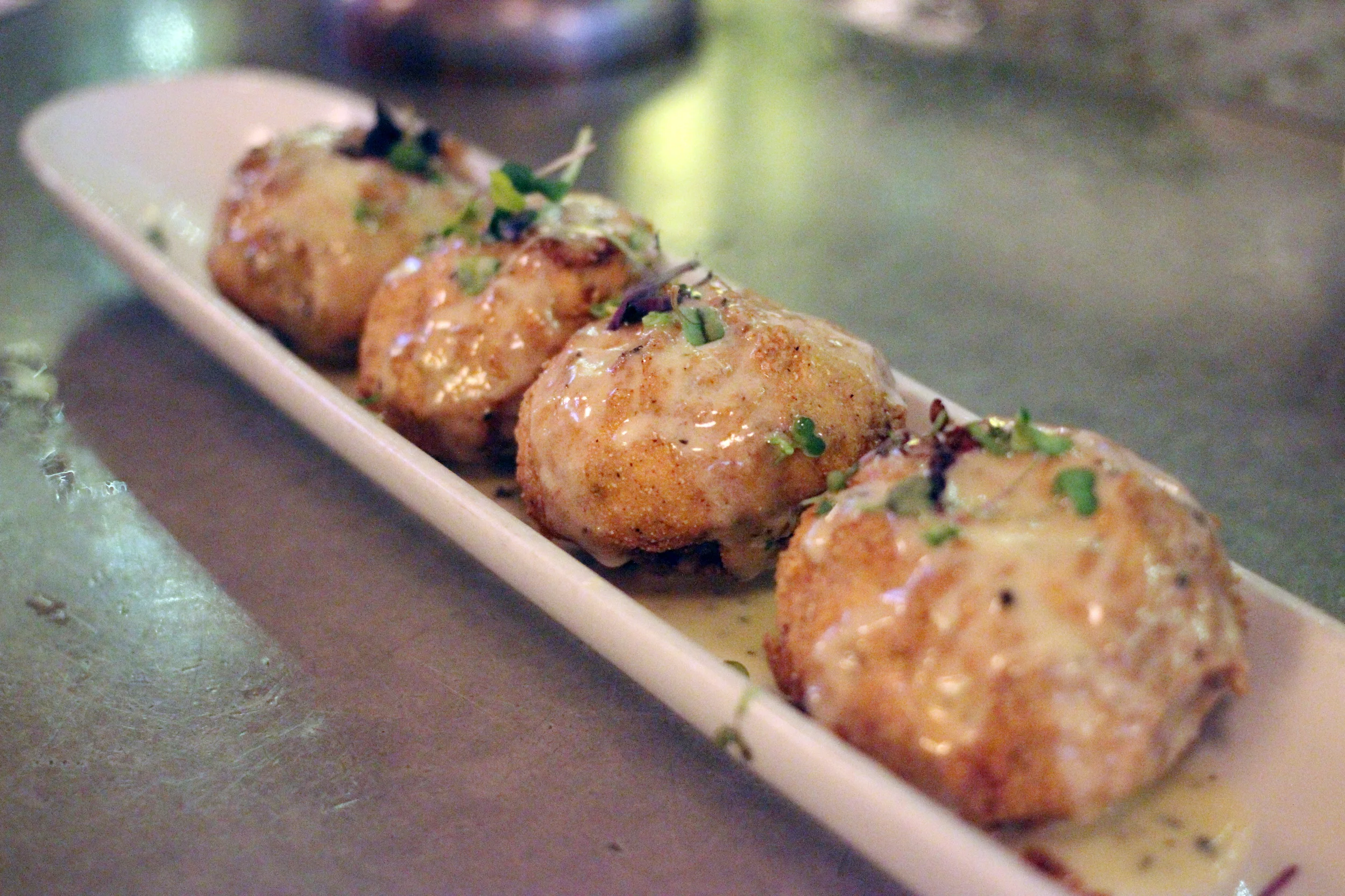 Cornmeal-crusted crab-stuffed mushroom caps