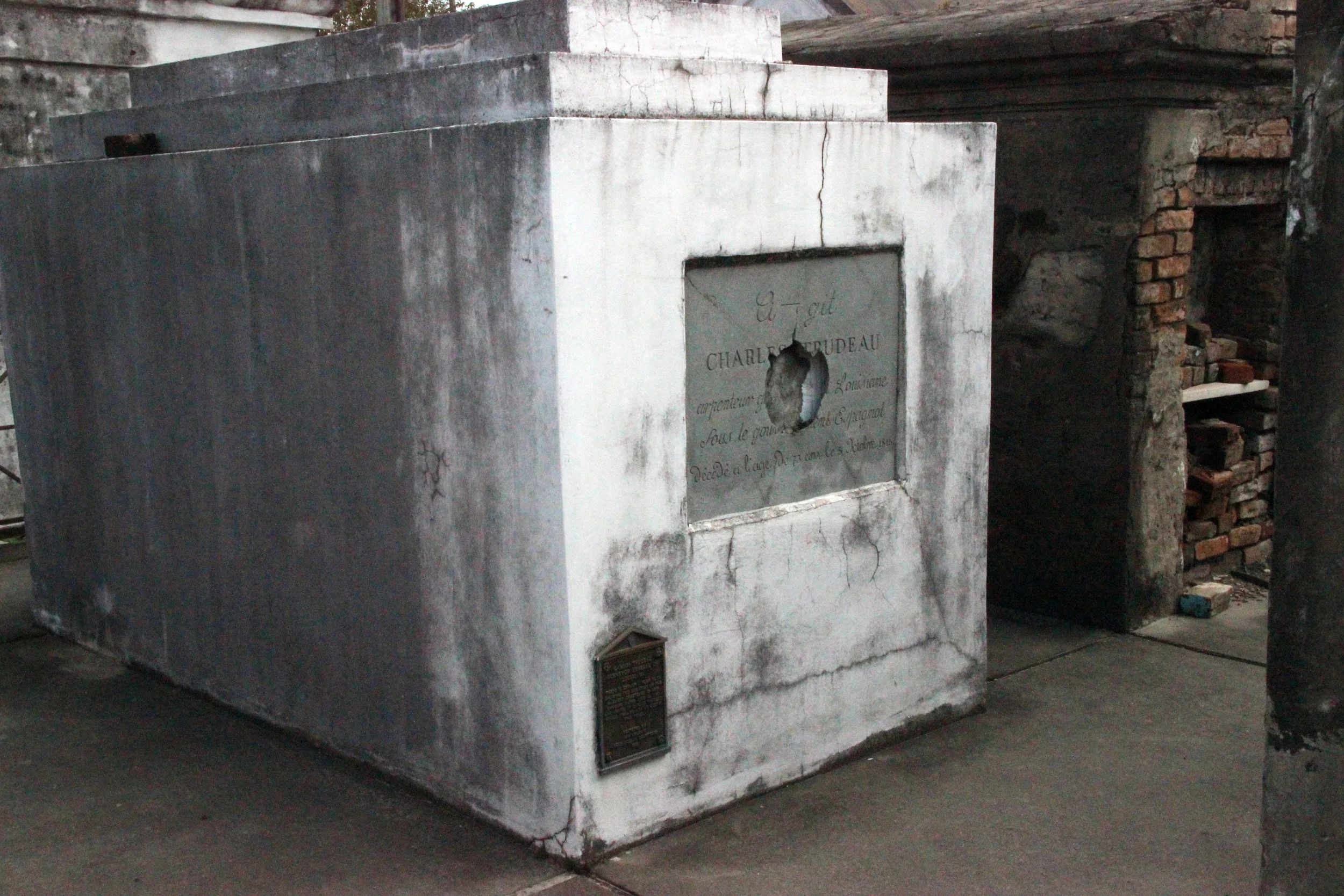 A tomb which was vandalized by someone intending to steal parts of the skeleton inside